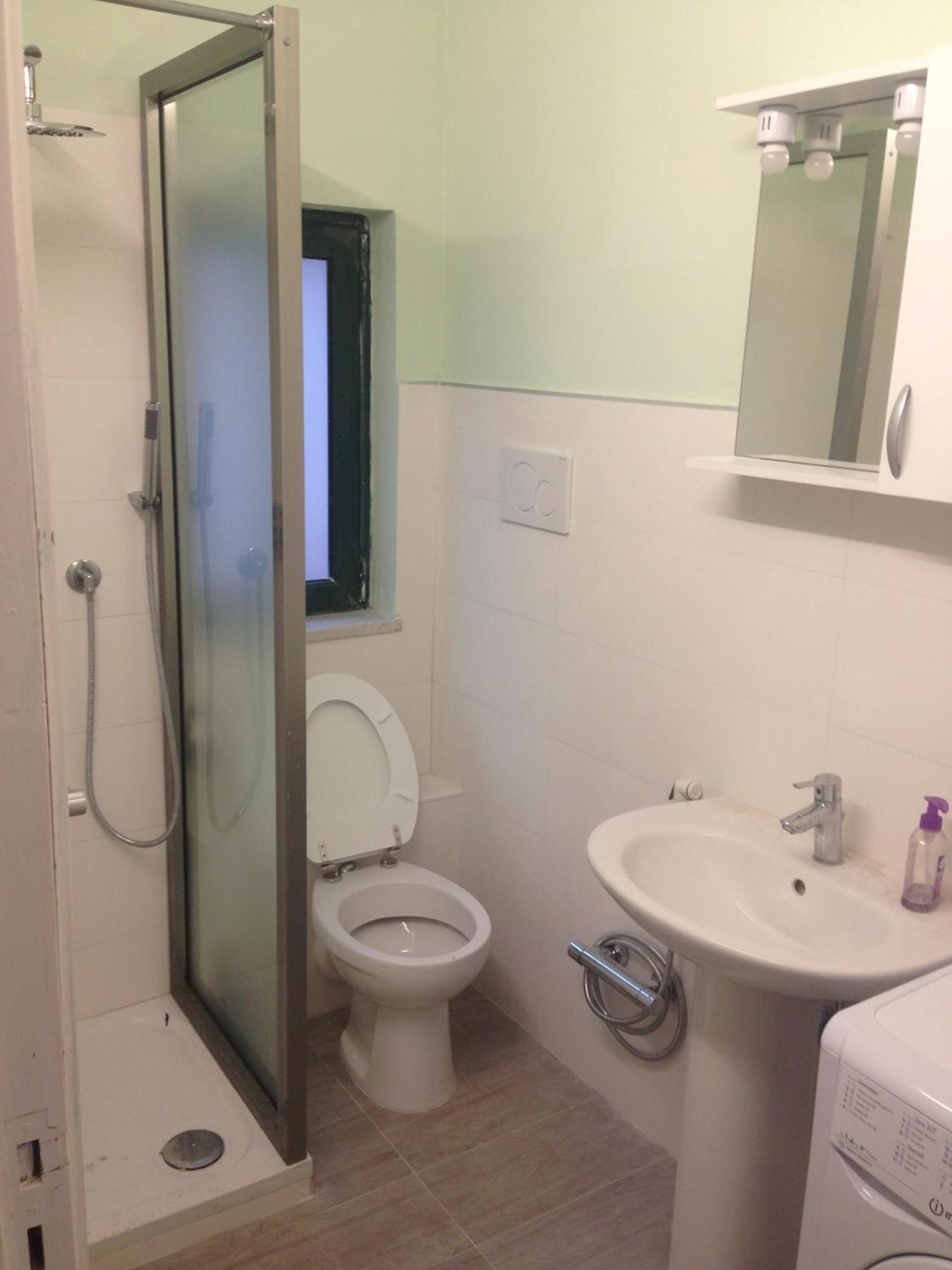 Monolocale I Delfini Apartment Мондело Екстериор снимка